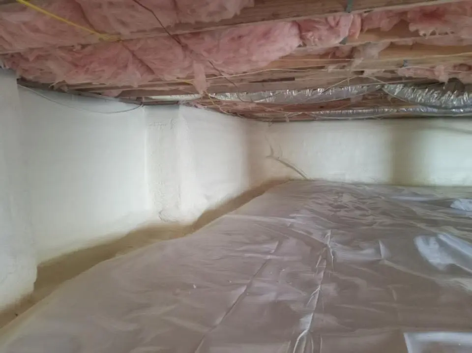 Crawl space encapsulation with closed-cell spray foam for Commercial Roof Restoration in Del City